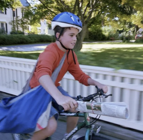 newspaper delivery boy